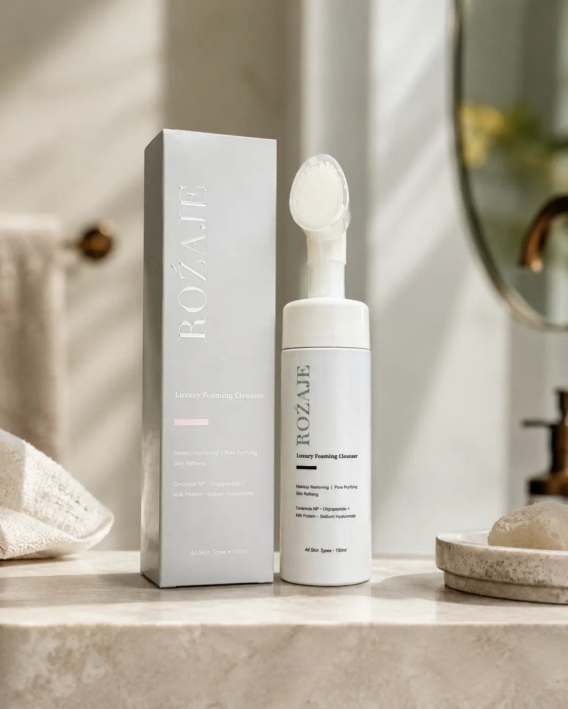ROŹAJE cleanser and carton in a softly lit bathroom